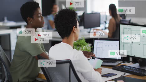 Animation-of-notification-bars-over-diverse-female-coworkers-discussing-reports-on-computer