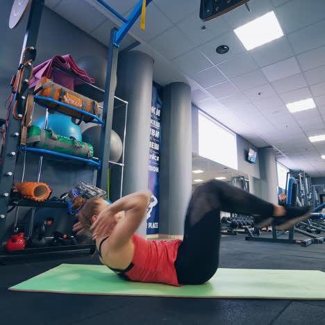 woman exercising on yoga mat