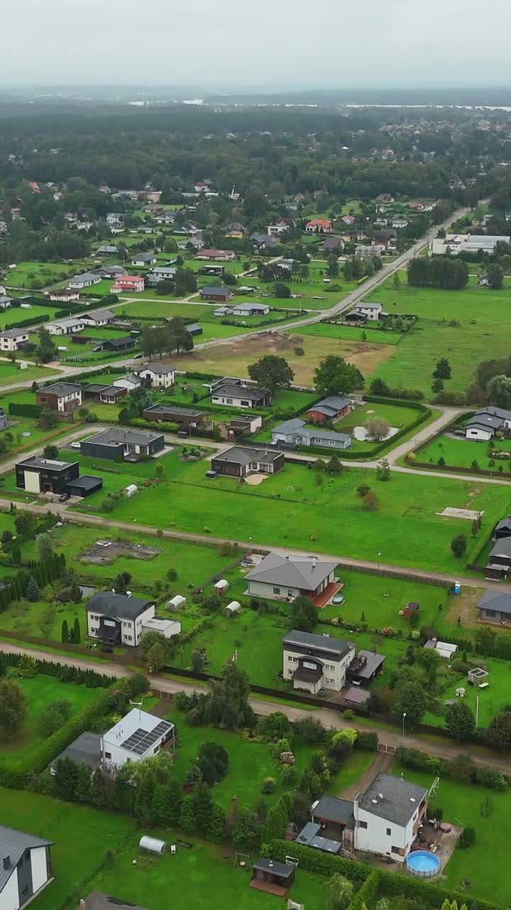 Aerial view of green landscape and houses in Ikskile, calm and scenic