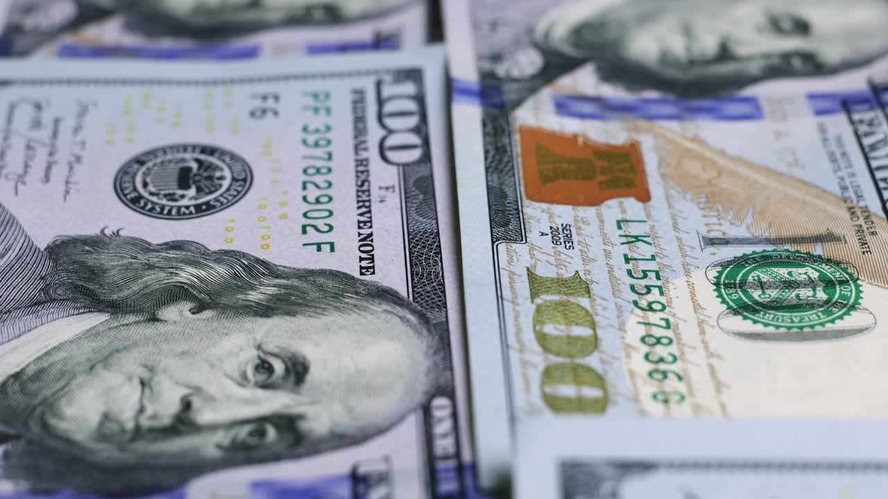 billetes de dólar estadounidense, dinero de papel, moneda de tasa de cambio. billetes de efectivo. el concepto de finanzas e inversión. cien dólares estadounidenses. economía empresarial