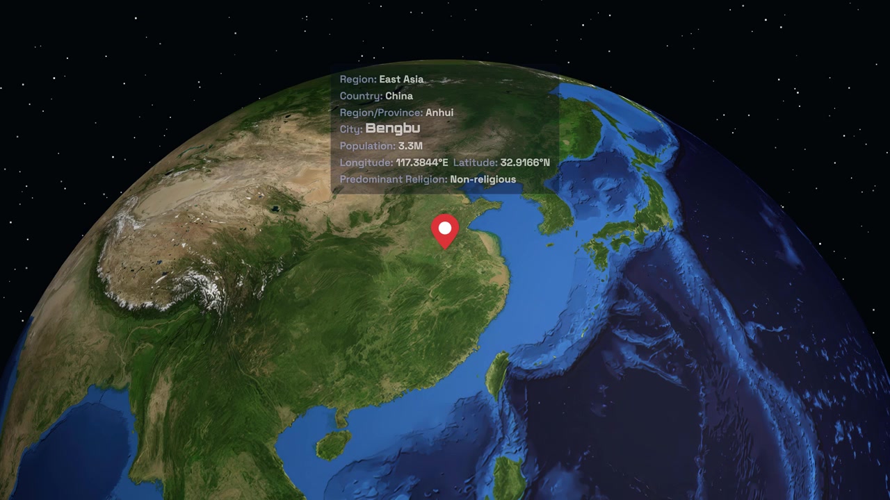 Digital globe rotates and zooms from space to a specific location marker in East Asia