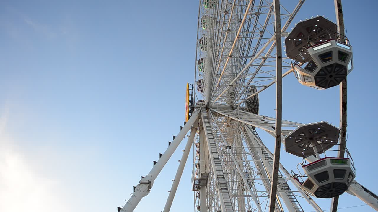 Big wheel against the sky. Shooting in the evening