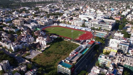 Aerial-View-of-Deportivo-Football-Stadium-in-Playa-Del-Carmen-Mexico,-Drone-Shot