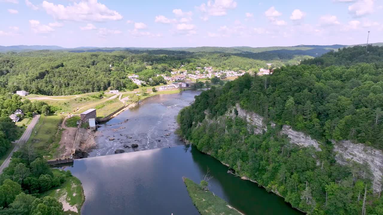aerial push in to fries virginia over the new river