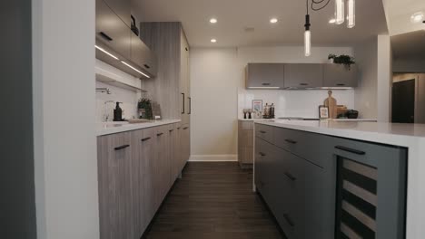 push in shot of a modern kitchen with bright accents and fixtures