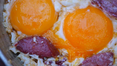 delicious turkish breakfast: fried eggs with sausage (sucuklu yumurta)