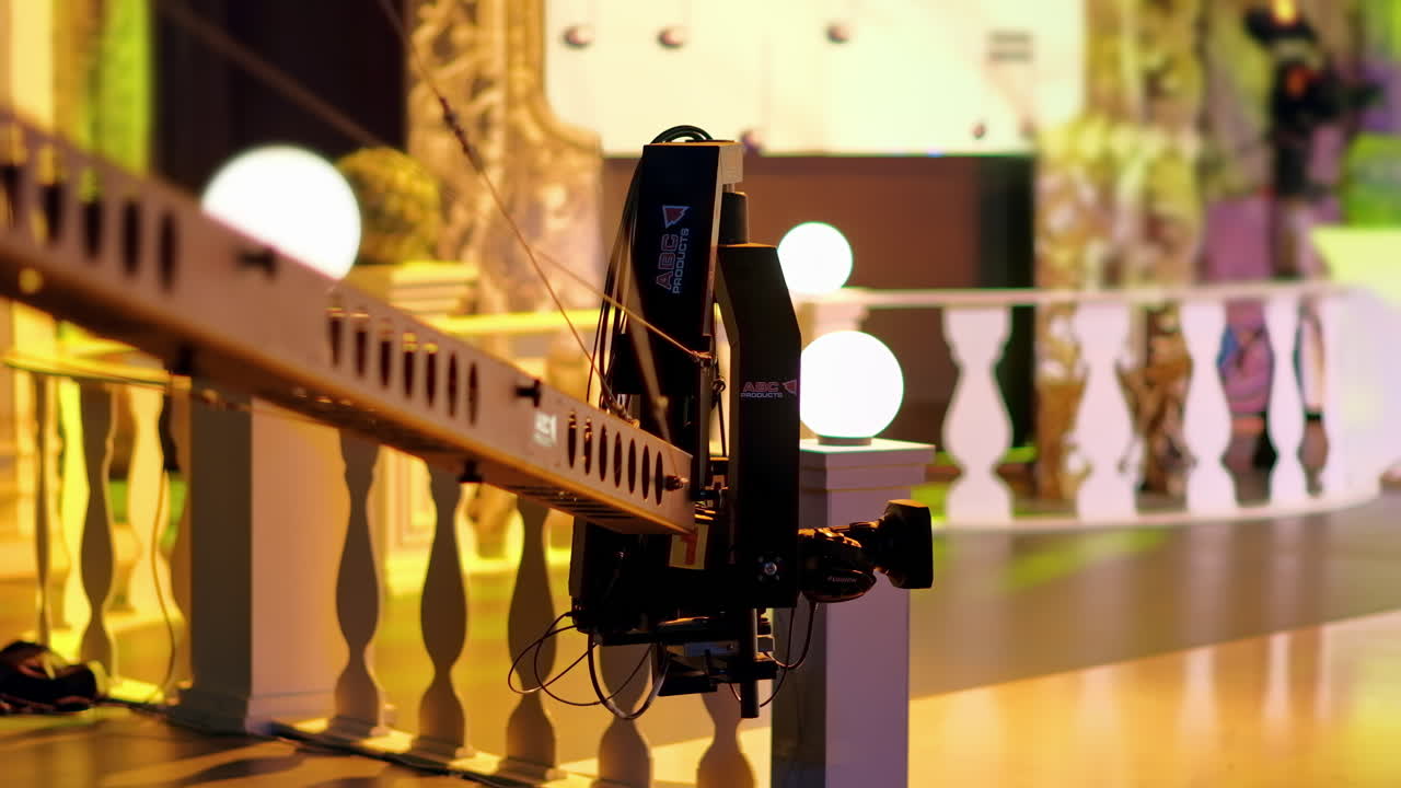 Professional camera filming with on the backstage of a TV set