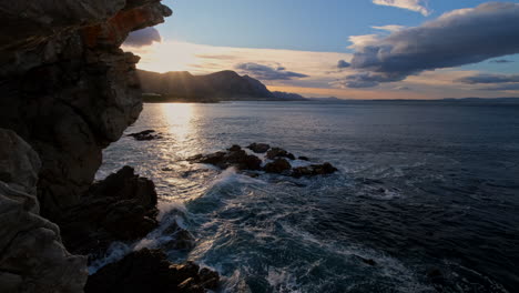 picturesque sunrise view over ocean from sea cliffs in seaside hermanus