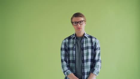 man in plaid shirt with glasses