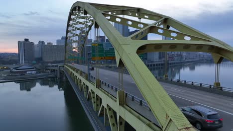 fort pitt bridge with pittsburgh skyline in background