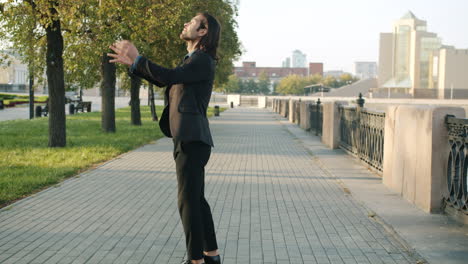 businessman walking in the city with a bag