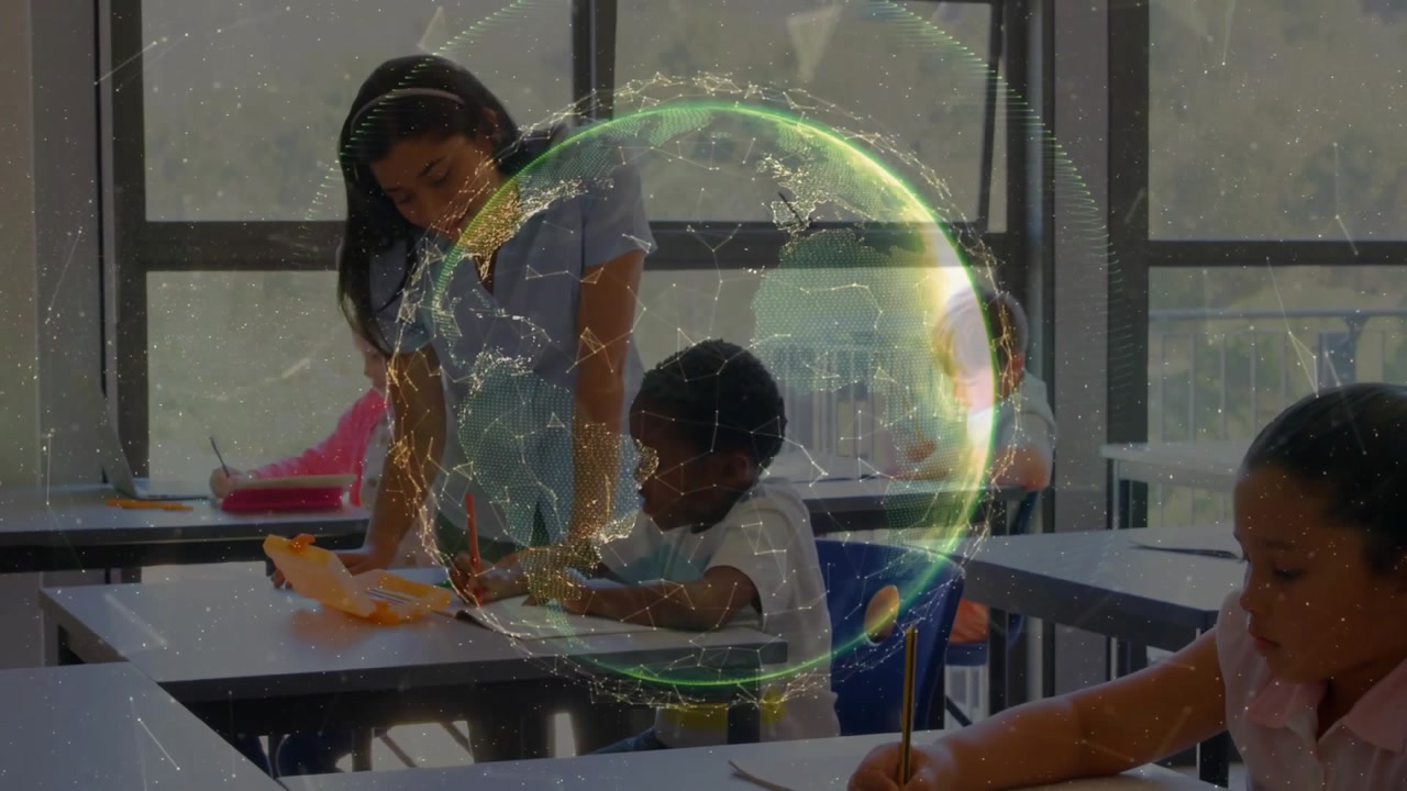 Teacher entering classroom and leaning over student desk guiding writing practice during class
