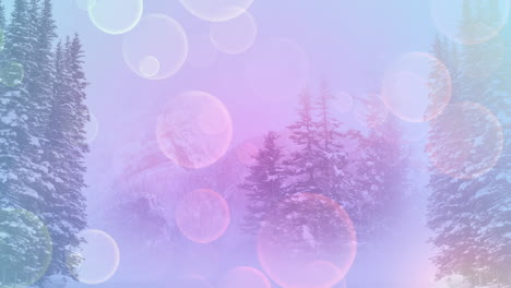 digital composition of purple glowing spots of light against snow landscape with trees