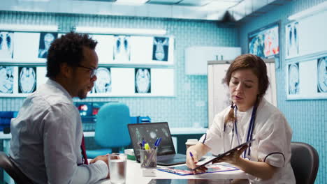 medical expert discusses test results with a patient in a healthcare setting