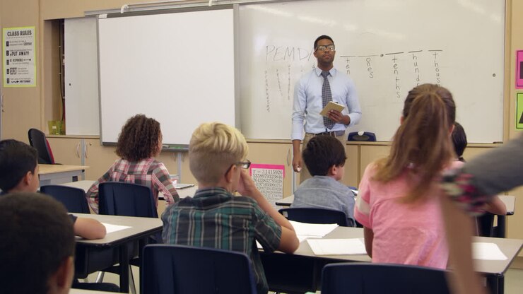 Schoolgirl answering question at front of class, shot on R3D