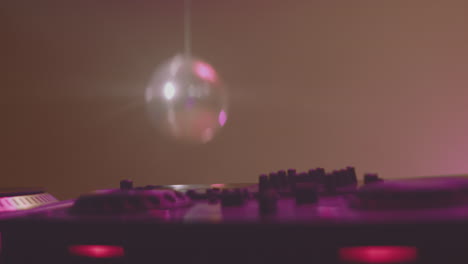 dj setup with disco ball
