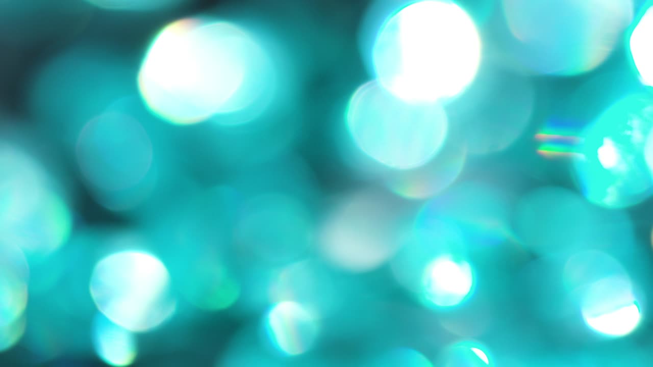 la rotación de los círculos bokeh en el sentido de las agujas del reloj