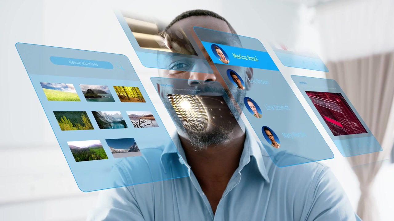 Man watching holo panels appearing and sliding across face, showing tech UI assets for designers