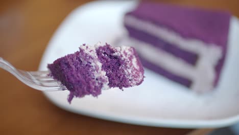 ube cake slice on a fork