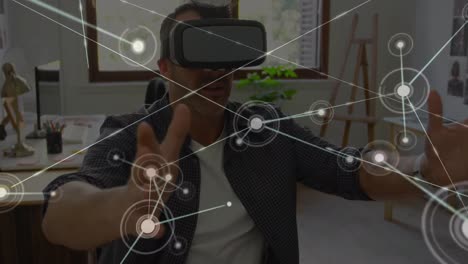 Animation-of-network-of-connections-over-man-wearing-vr-headset