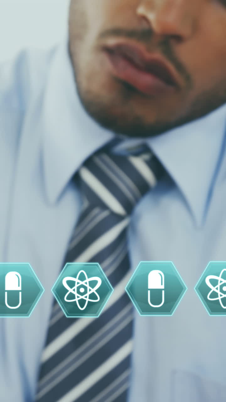 animación de iconos médicos sobre el médico masculino biracial