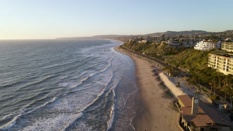 San-Clemente-Pier-Beach,-California---Gorgeous-View-Of-An-Expensive-Resort-With-Calm-Sea-and-Unique-Buildings---Aerial-Shot