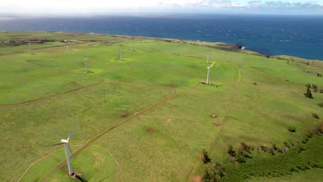 hawi wind farm on upolu point of hawaii's big island with an aerial view of the ocean and wind turbines generating clean, alternative energy