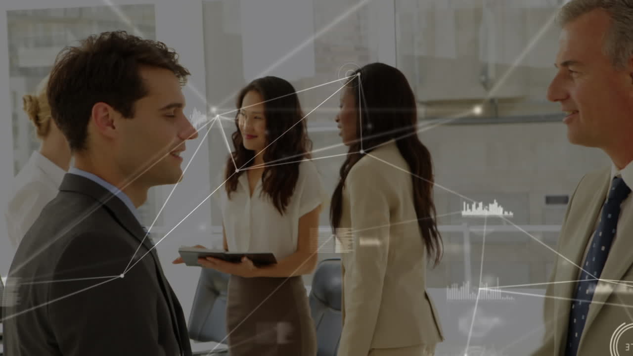 두 명의 백인 사업가들이 사무실에서 손을 흔드는 것을 반대하는 연결망