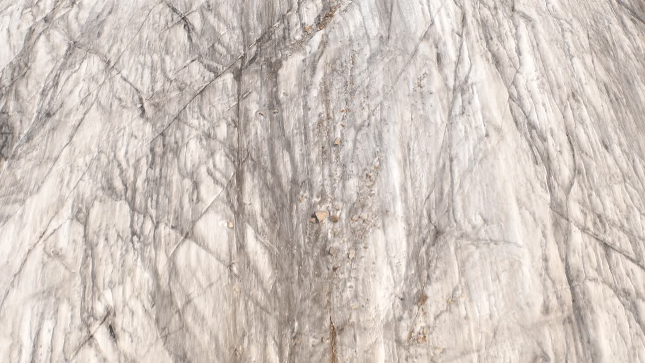 White marble surface with fine veins, close-up view, natural textures from Norway