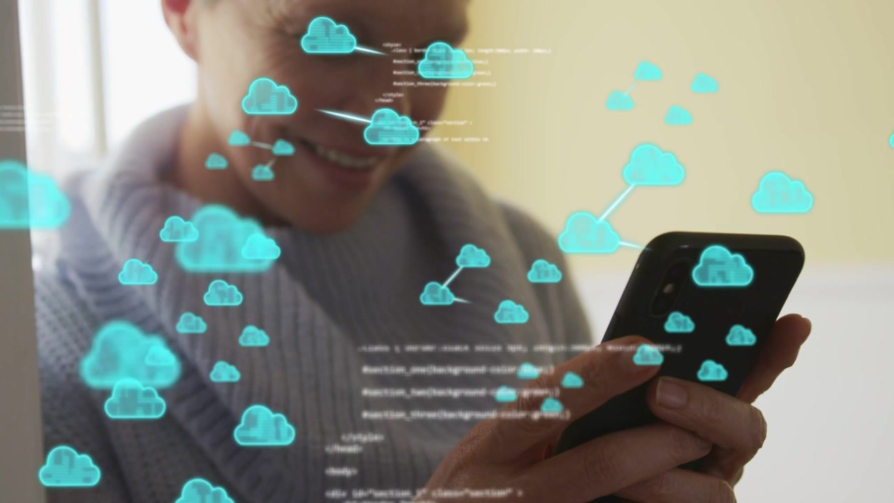Woman holding phone by lit window, tapping, causing tech cloud code over hands growing then fading