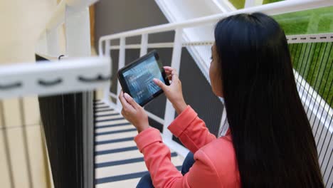 young woman working in a creative office