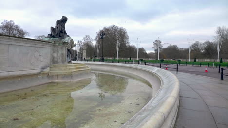 stabilized, 4k shot of the iconic buckingham palace square empty, no tourists, during covid-19 pandemic