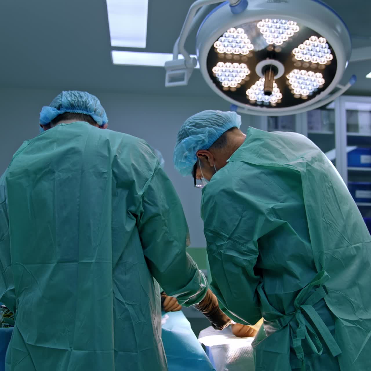 Professional surgery team working in emergency room. Operation surgical process