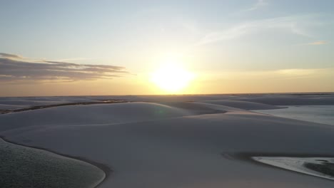 sunset over the lençóis maranhenses national park in brazil