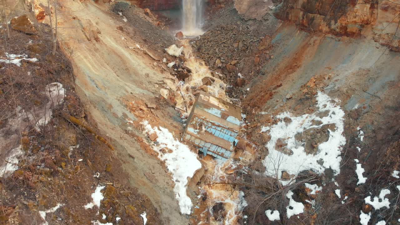 Landslide Waterfall and Damaged Structure