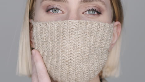 close up of woman in crochet face mask