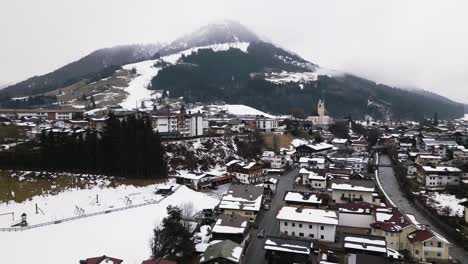 township of kirchberg in austrian alps, aerial drone view