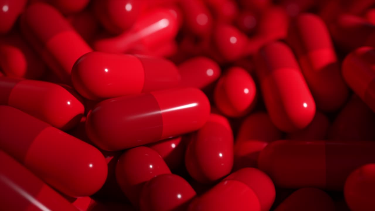 close-up de muitas pílulas vermelhas