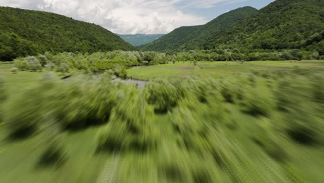 Shoreline-waters-and-lush-vegetation-of-Tkibuli-lake-reservoir-valley