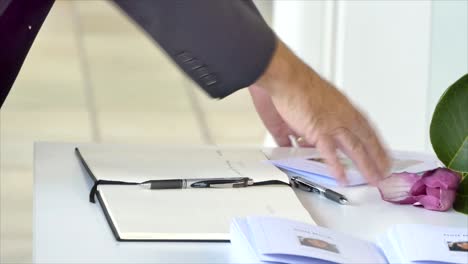 signing of memorial book at a funeral