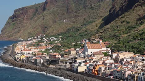paul do mar church and town centre, madeira portugal, drone telephoto establishing shot