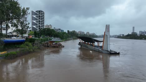 low angle drone shot of destroyed city cat boat ferry terminal-1