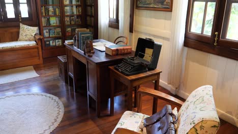 vintage home office with typewriter and books