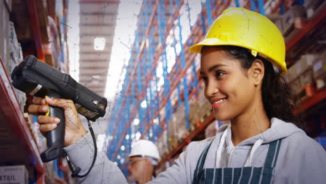 Scanning boxes with barcode scanner, warehouse worker wearing yellow safety helmet