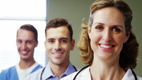 Portrait-of-doctors-and-nurse-standing-in-hospital