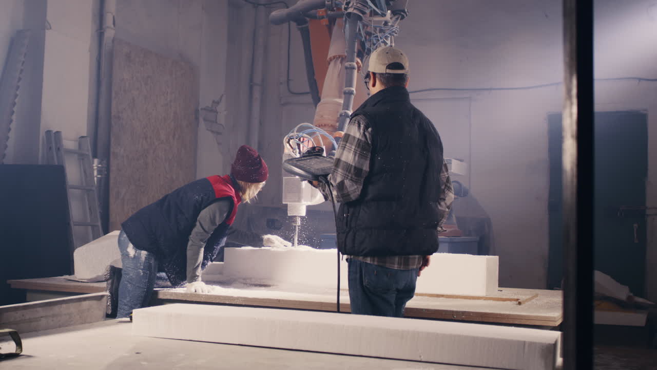 Foam Cutting and Fabrication Process with Robotic Machine and Workers