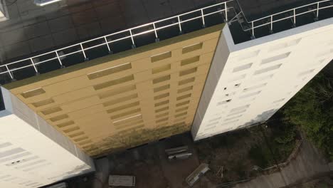 drone offers a direct overhead view of building rooftops and urban pattern in nantes, france. city planning, urban area overview