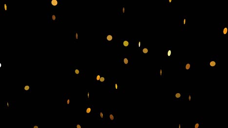 animation of falling golden coins on black background.