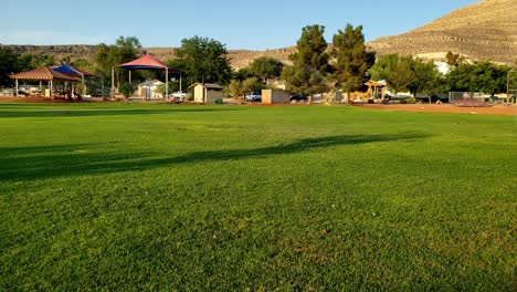 rural park and morning panorama of a soccer field in southwest usa