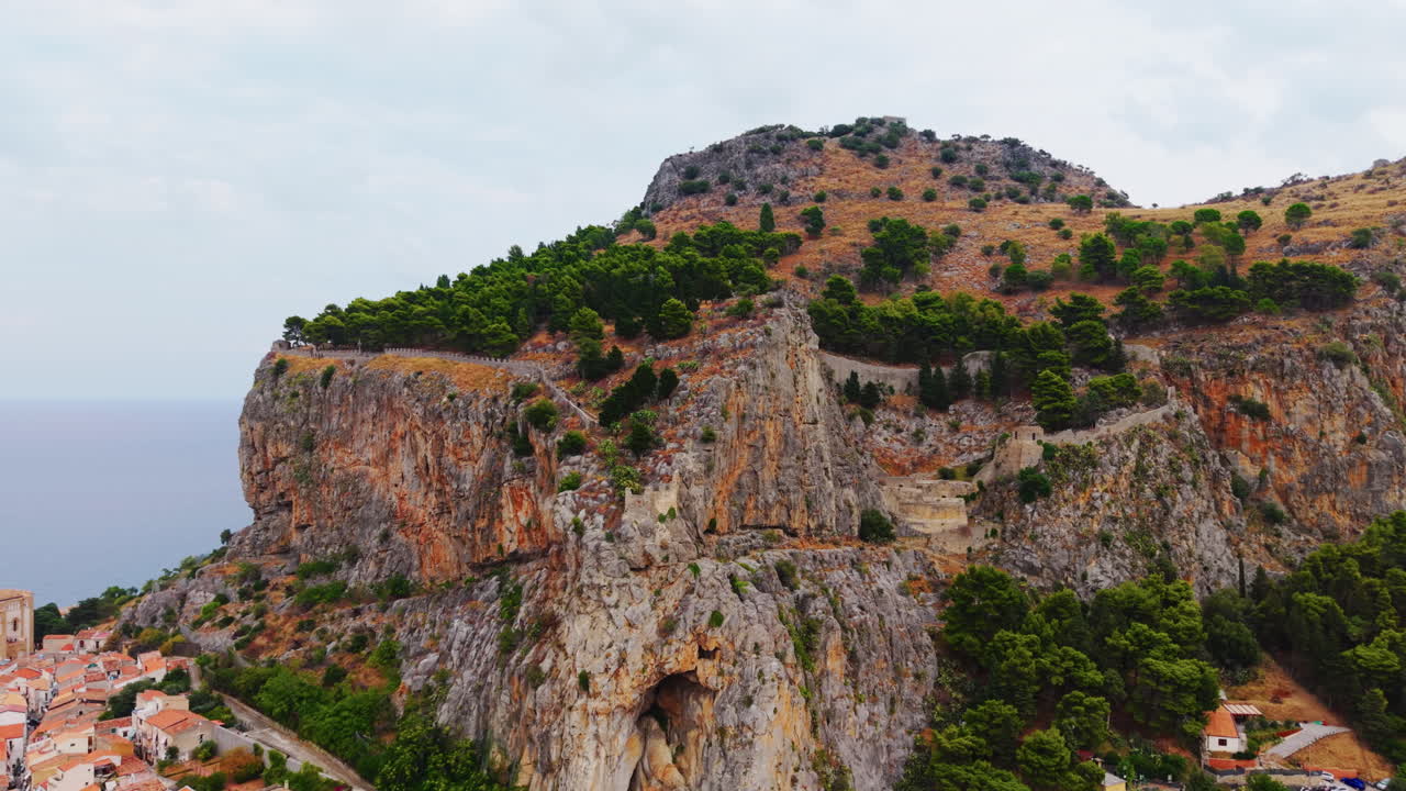 Cefalù's scenic cliffs and historic town create a serene landscape